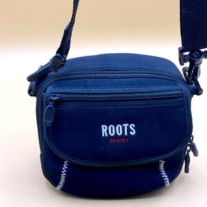 ROOTS Camera Case with detachable strap.  Very good condition